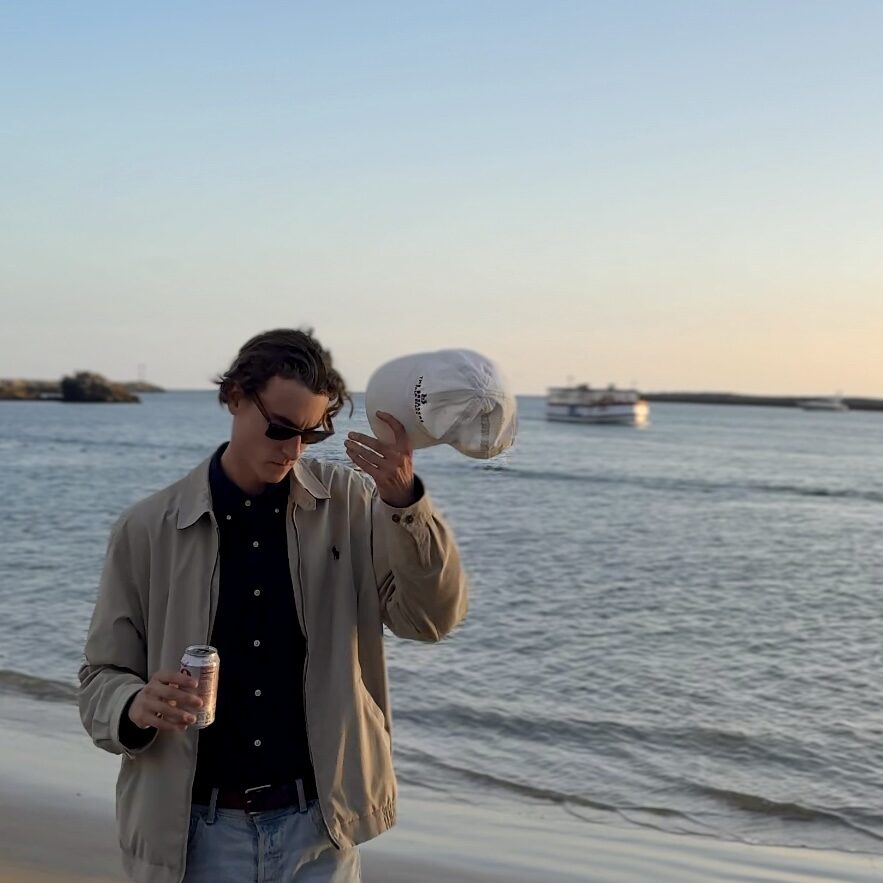 Christopher Mayer at the beach at golden hour